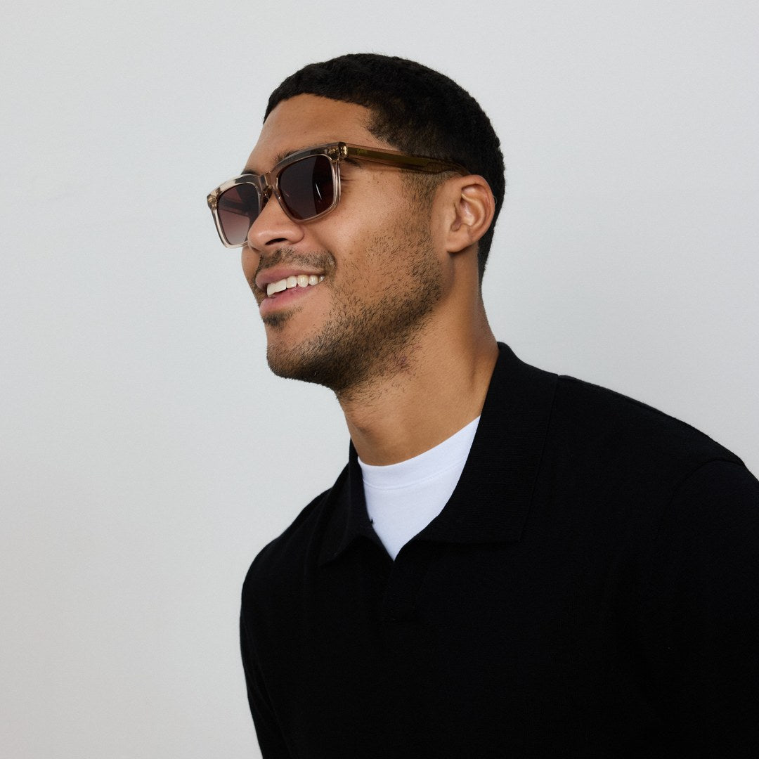 Man wearing Yume Somnia Champagne Gold sunglasses