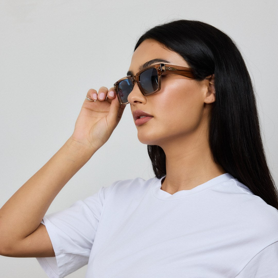 Woman wearing Yume Aurien Brown/Blue sunglasses
