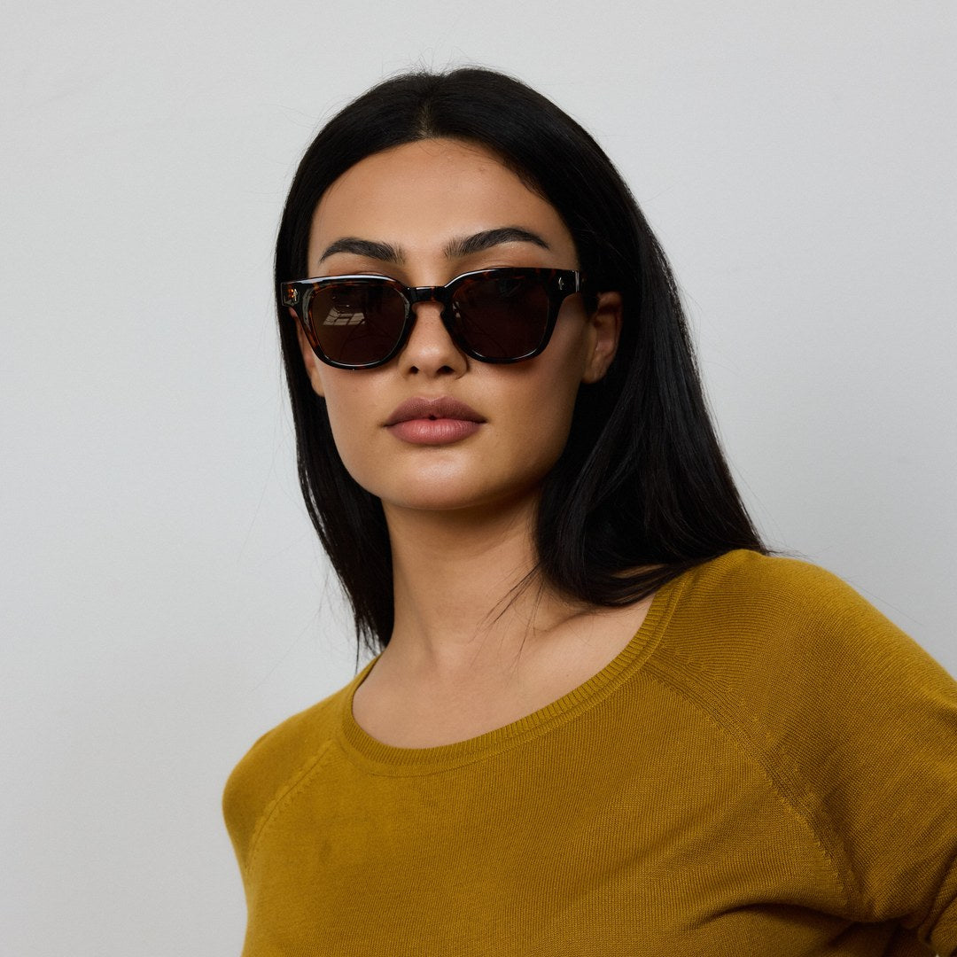 Woman wearing Yume Noema Tortoiseshell sunglasses