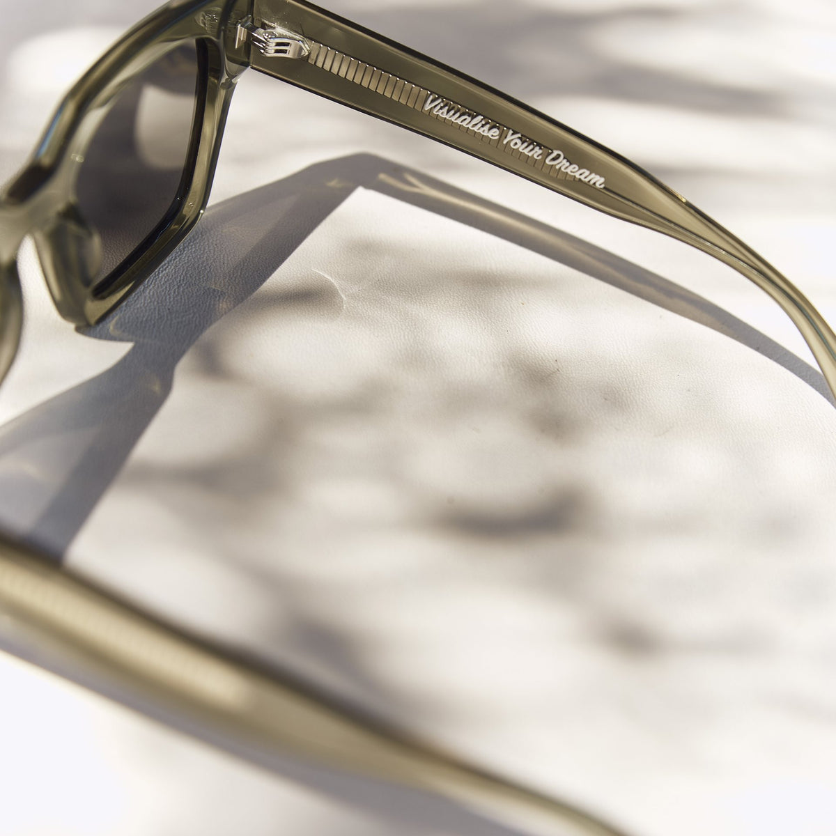 Close-up of the Visualise Your Dream engraving on the Celuna Olive arm