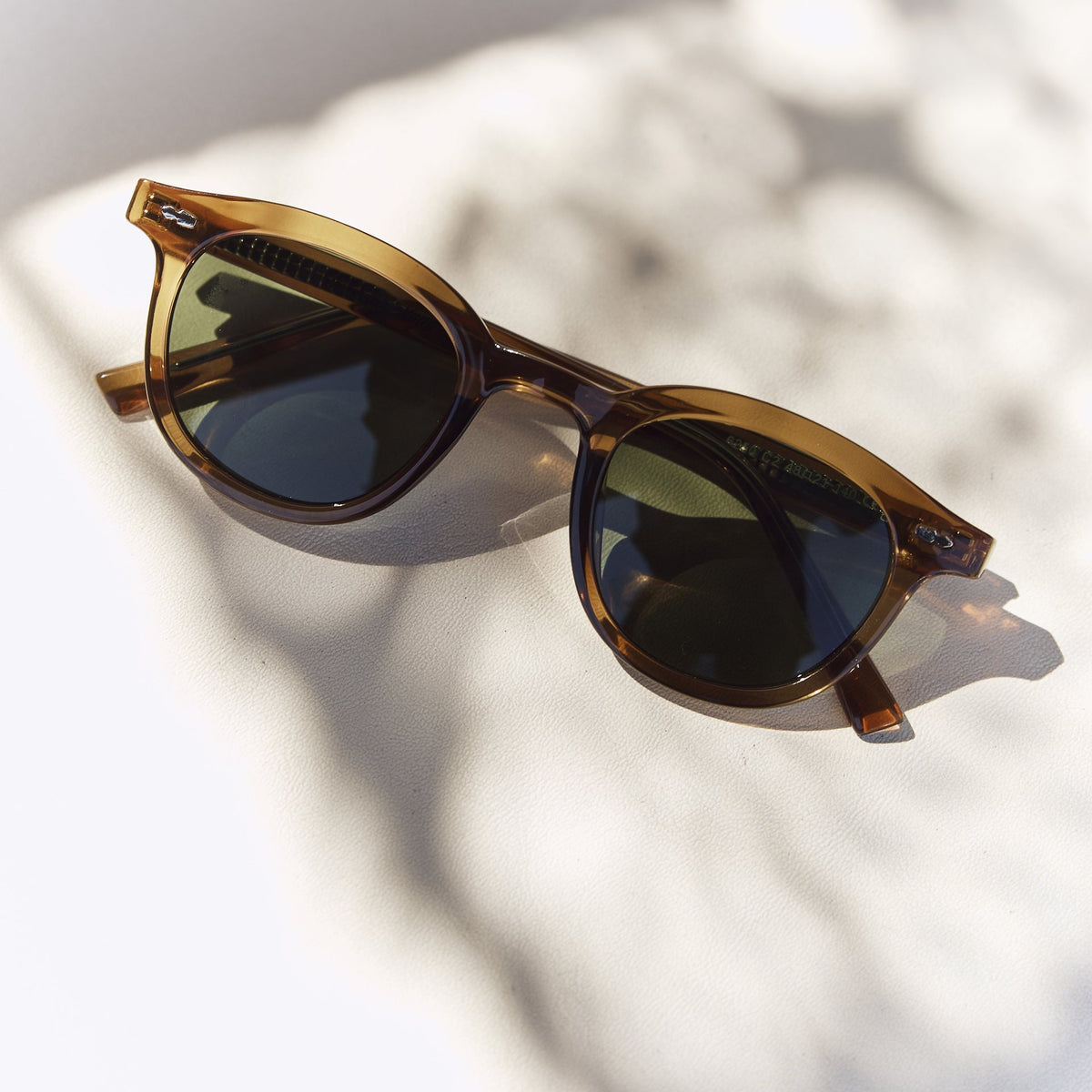 Noxie Brown/Green sunglasses, amber acetate frame with green lenses