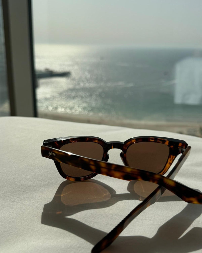 Noema sunglasses styled for holiday