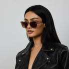 Woman wearing Yume Somnia Champagne Gold sunglasses