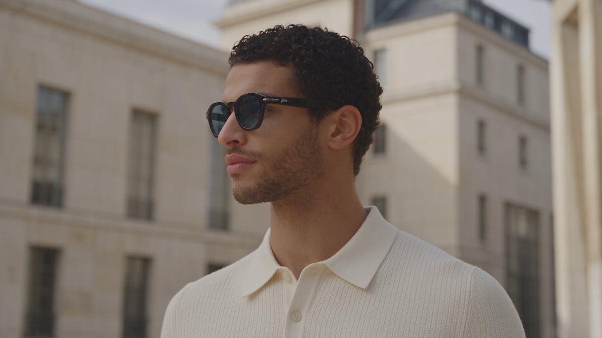 Video: model wearing Yume Mirae – Black/Blue sunglasses