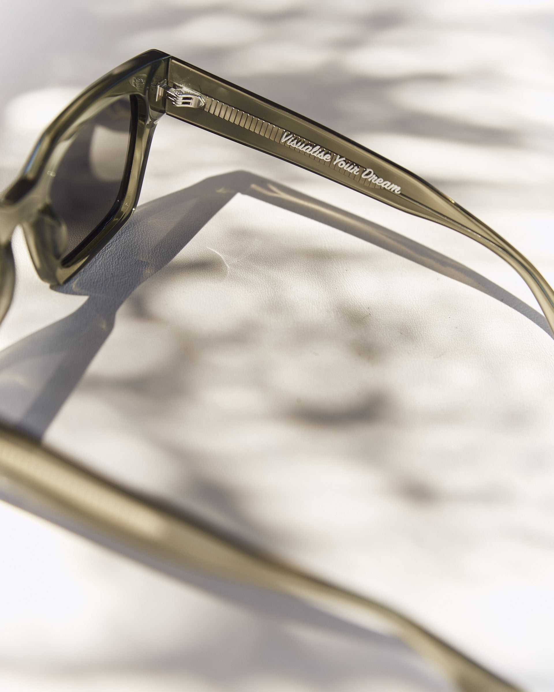 Close-up of the Visualise Your Dream engraving on the Celuna Olive arm