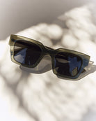 Celuna Olive sunglasses with dark lenses, angled view