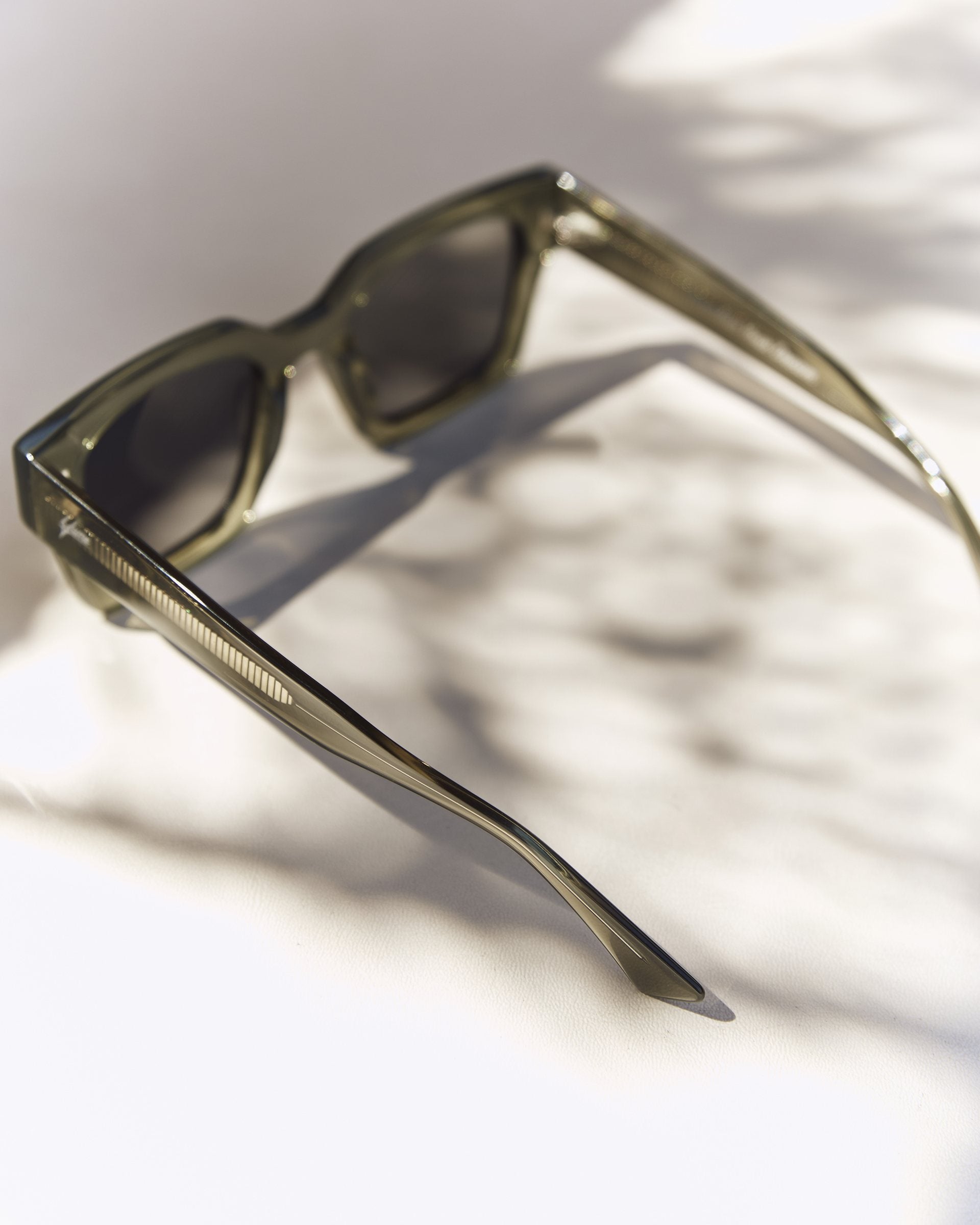 Celuna Olive sunglasses, side view of the olive acetate arms